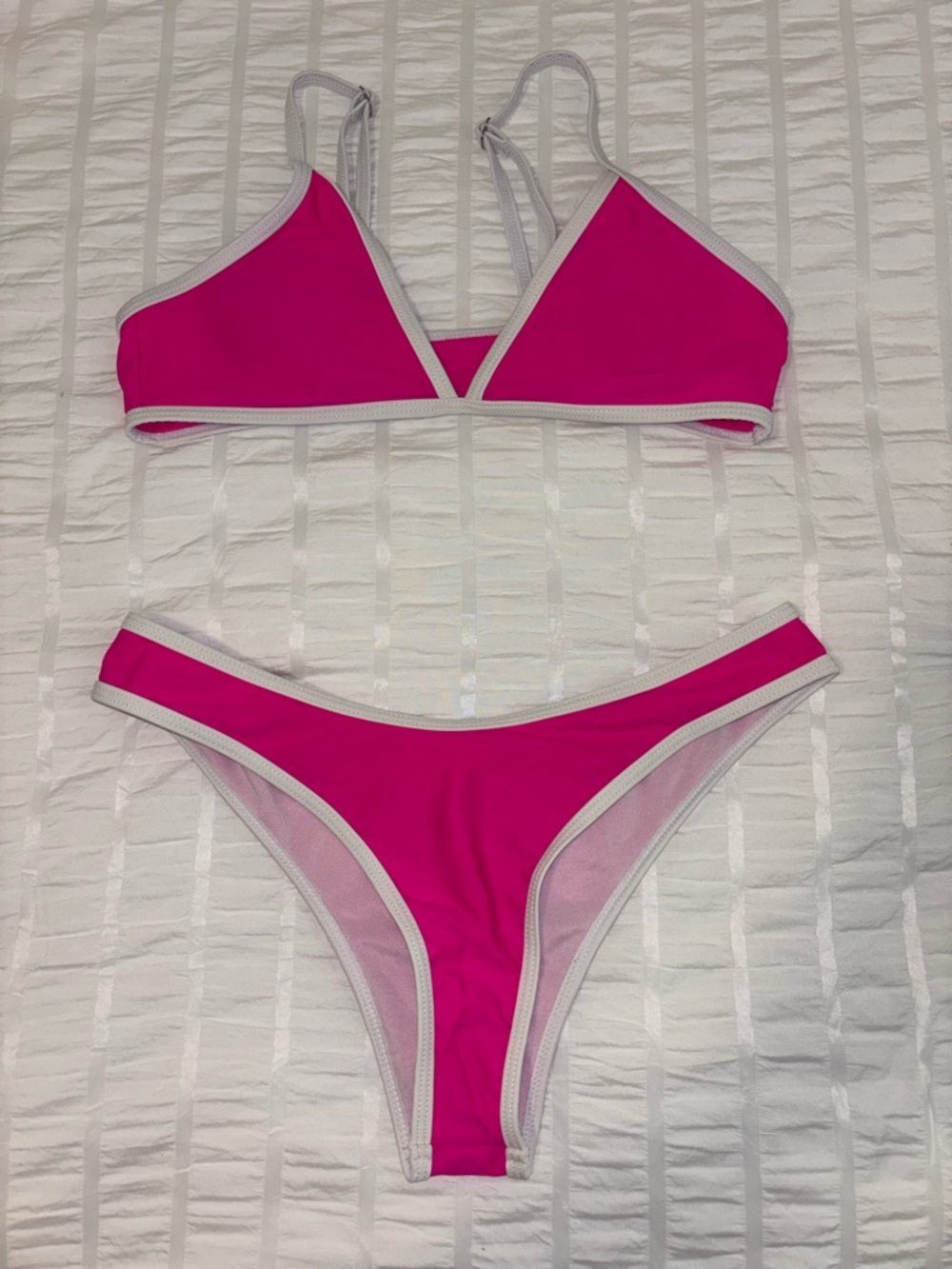 pink and white bikini set